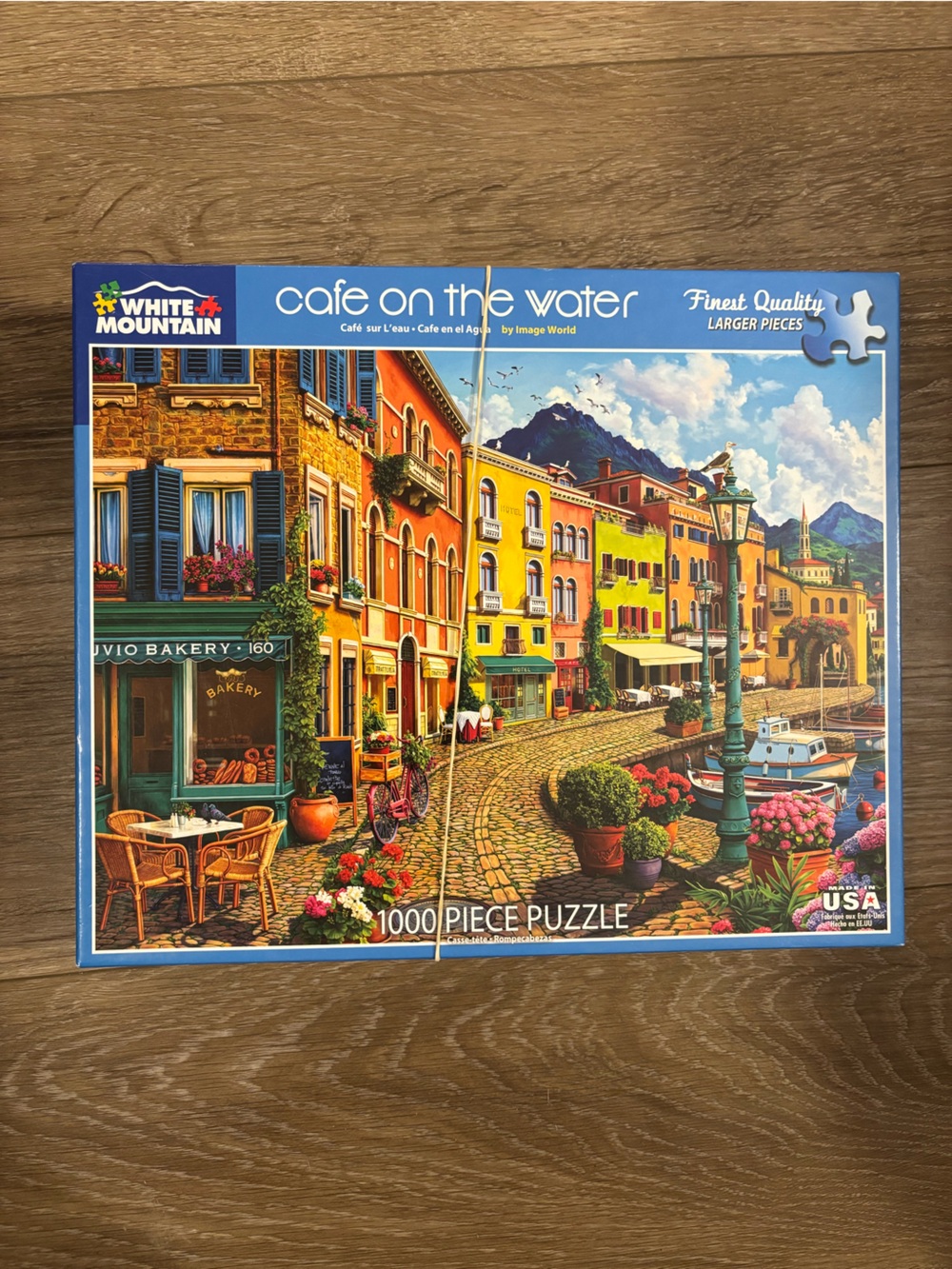 Cafe on the Water White Mountain Multi-Color Coastal Village 1000-Piece Puzzle